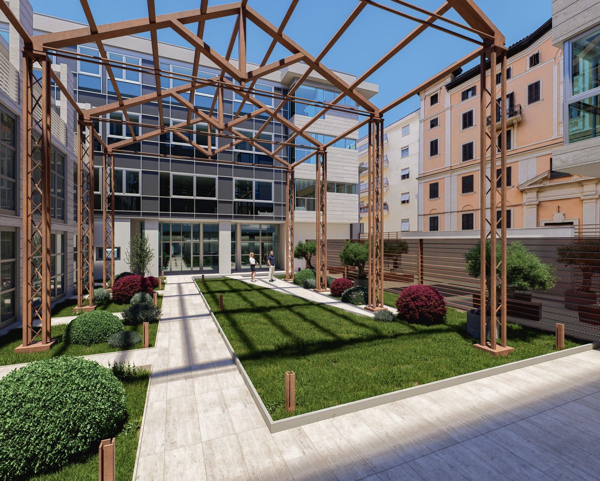 Giardino interno con pergola in acciaio